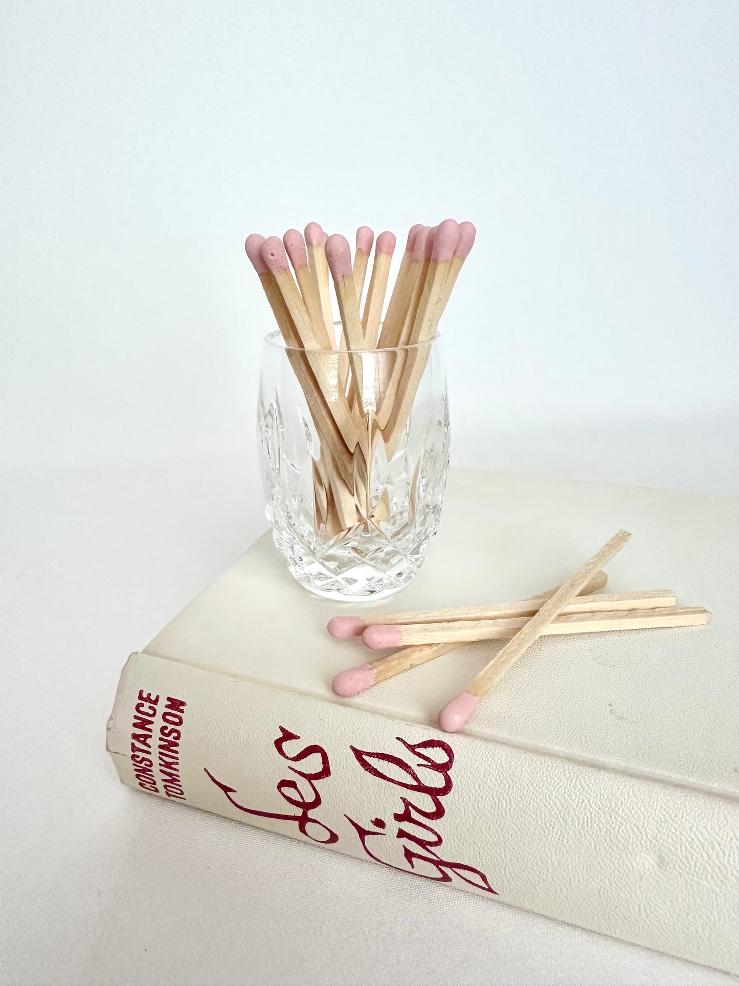 Vintage Waterford crystal matchstick holder with light pink matchstick bundle