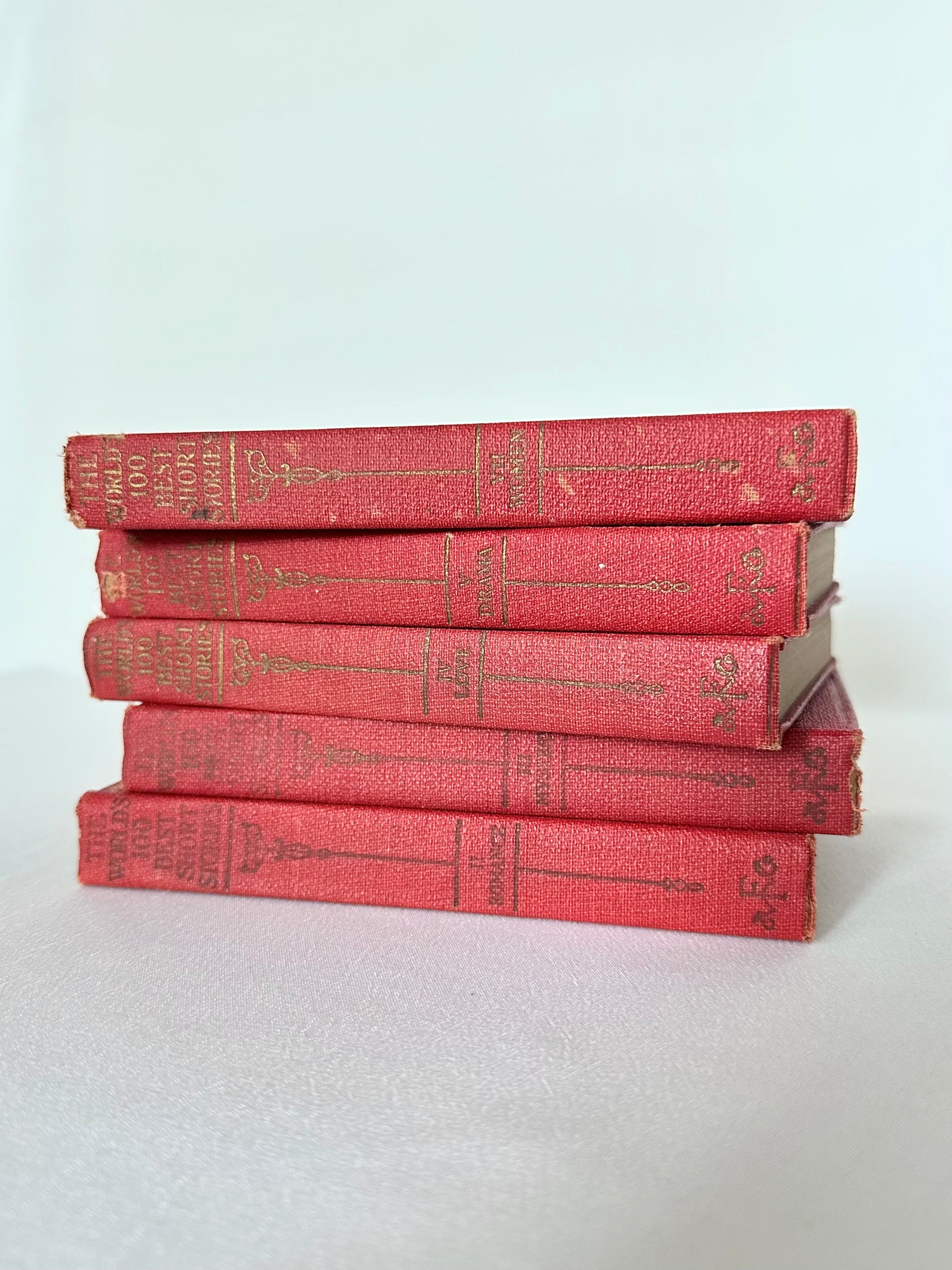 Vintage small red short stories hardcover book stack set of five.