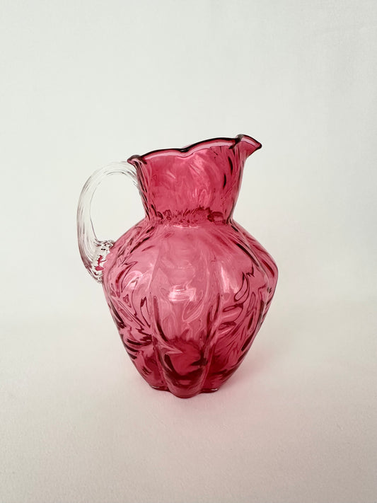 Vintage cranberry glass textured small pitcher or creamer by Fenton Glass.