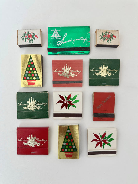 Vintage christmas themed matchbooks and matchboxes set  of twelve.