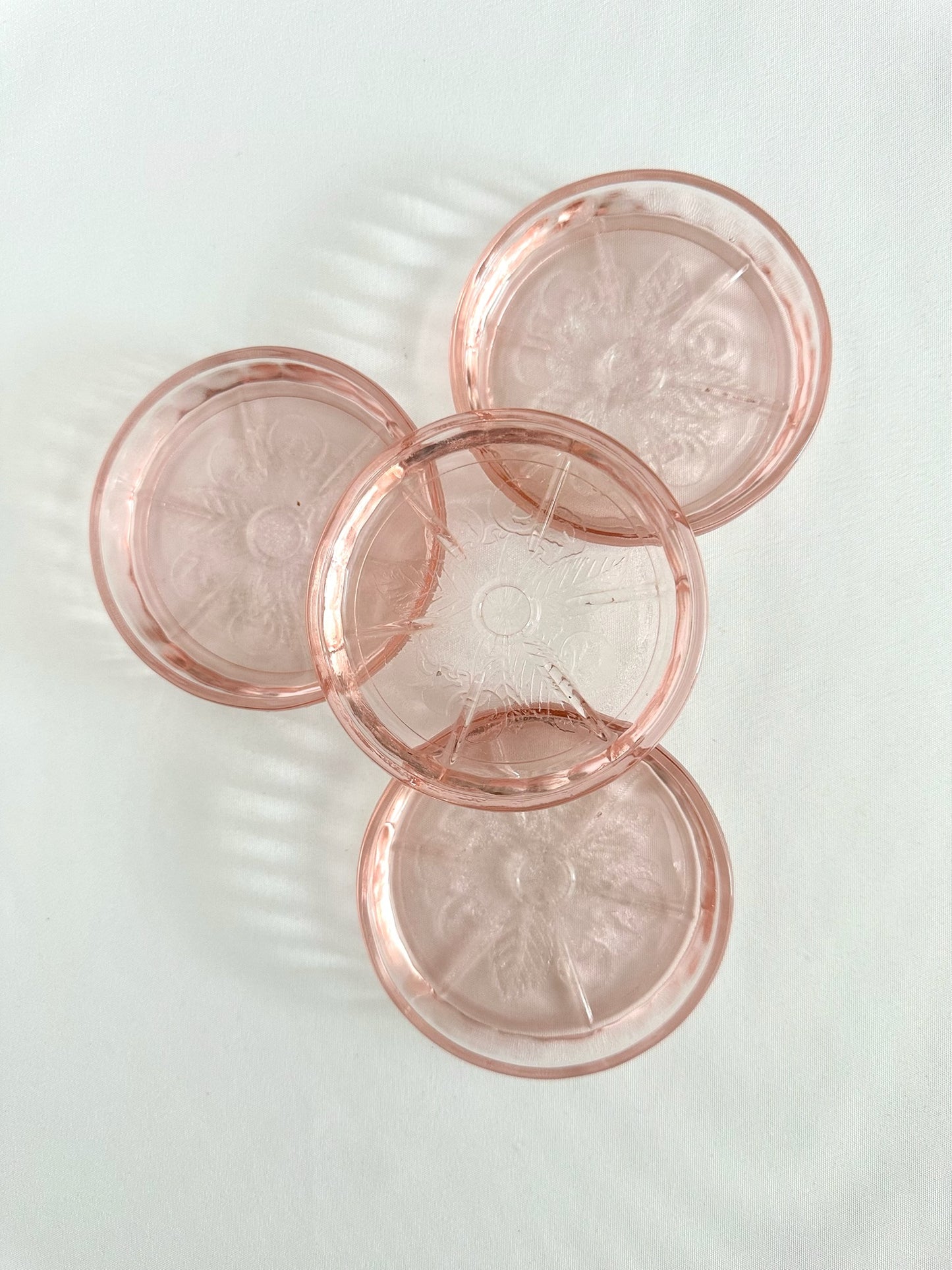 vintage blush pink cherry blossom embossed glass coasters set of four by Jeannette Glass
