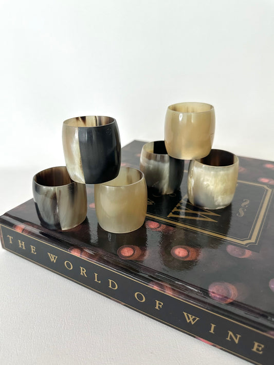 Vintage natural horn napkin rings set of six with variations in color and tone