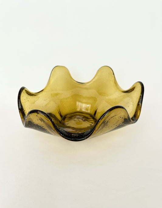 Vintage wavy edge decorative amber glass bowl.