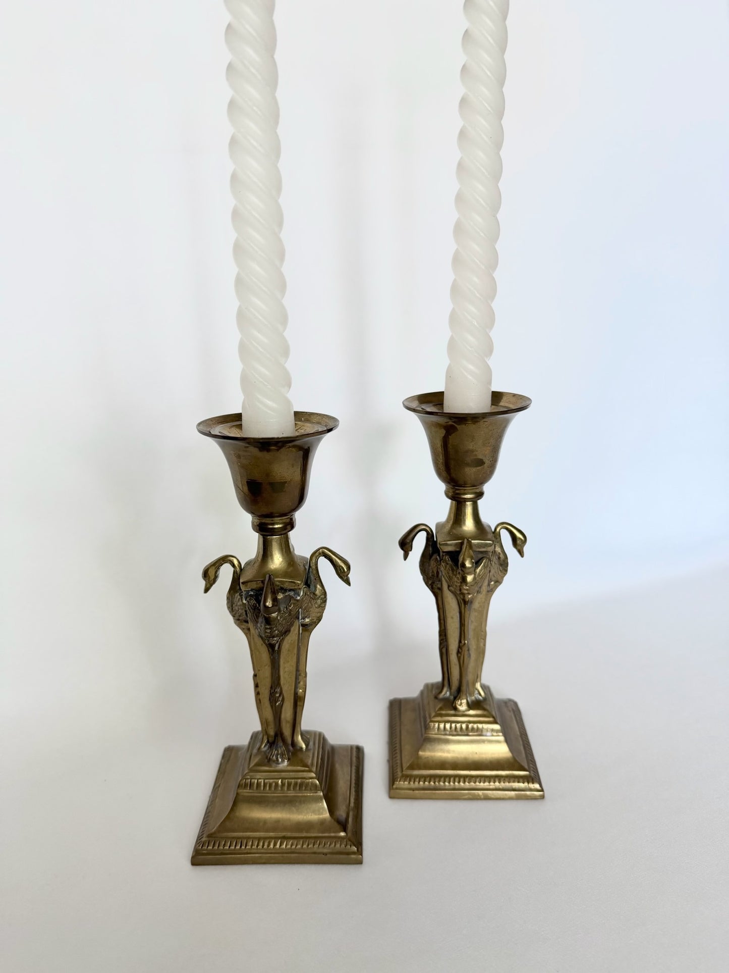 vintage brass candlesticks set of two with sculptural flamingos on four sides