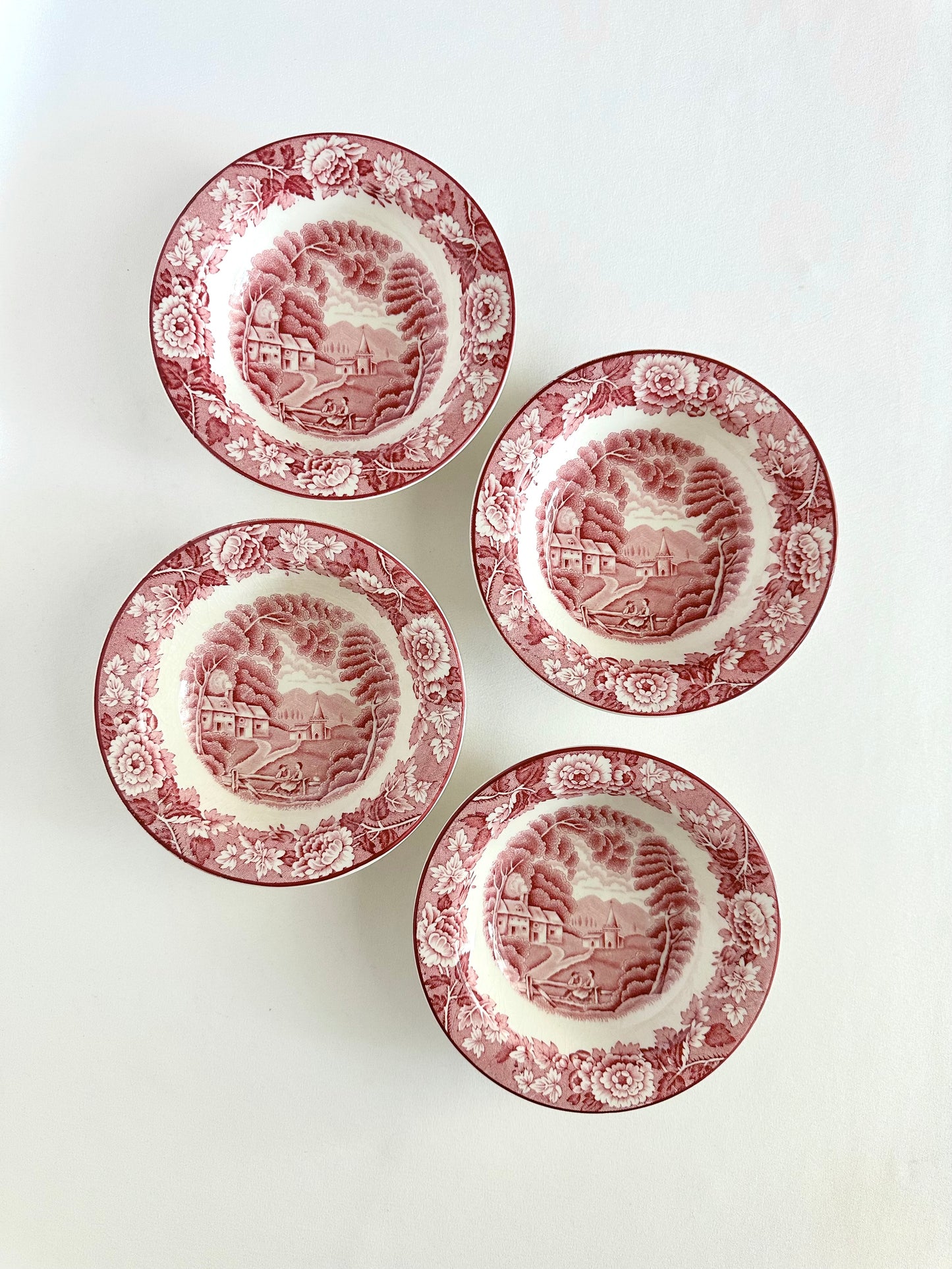 Vintage red transferware set of four small fruit bowls with English countryside scenery.