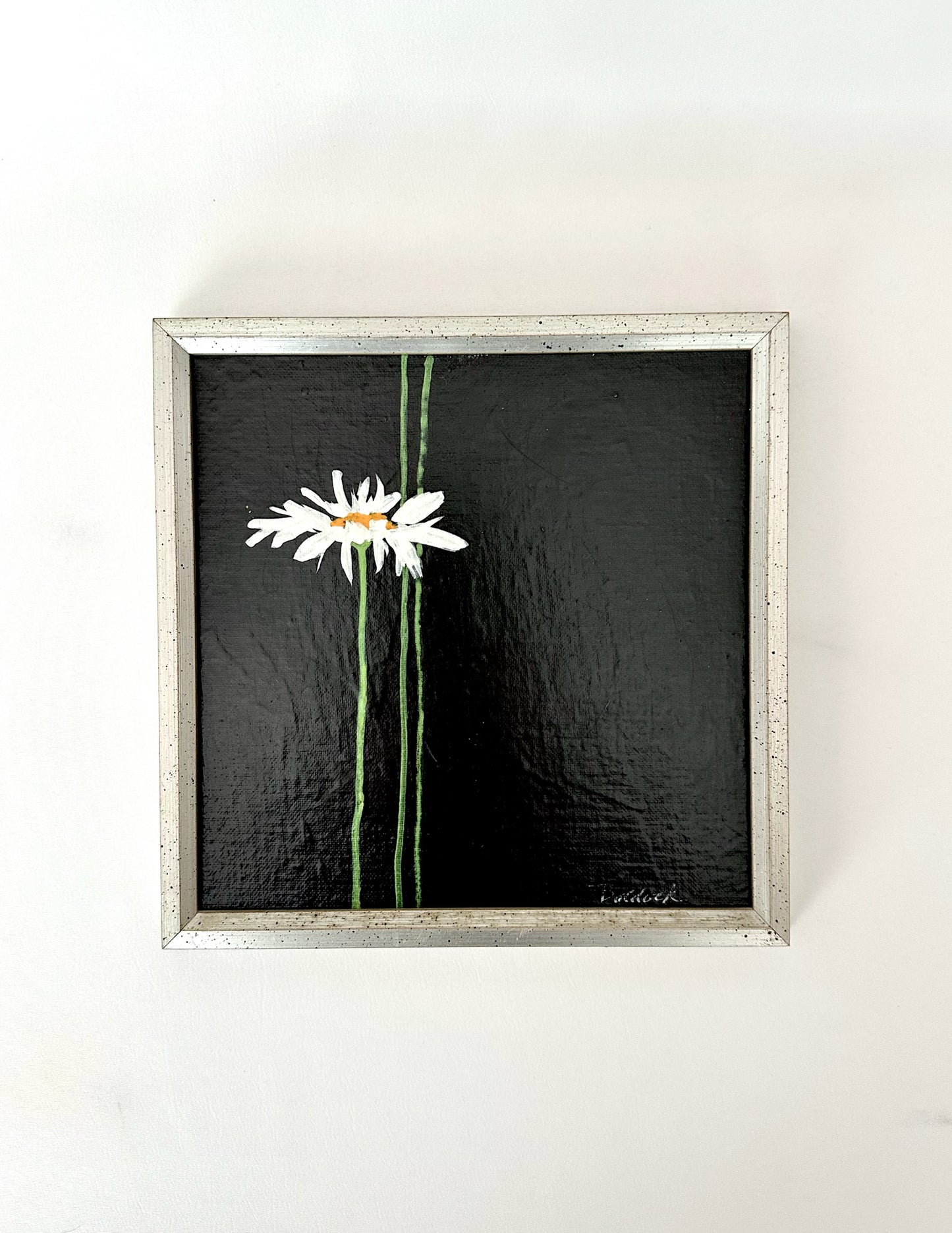 vintage framed original signed painting with daisy on a black background