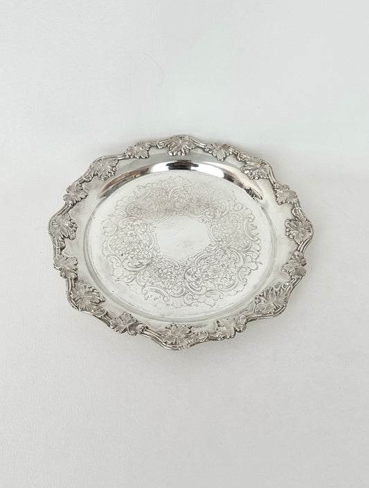 vintage small round etched silverplate tray with scalloped edge trimmed in grape leaves