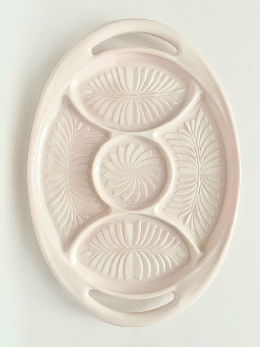 vintage pink milk glass oval tray with embossed sections and handles