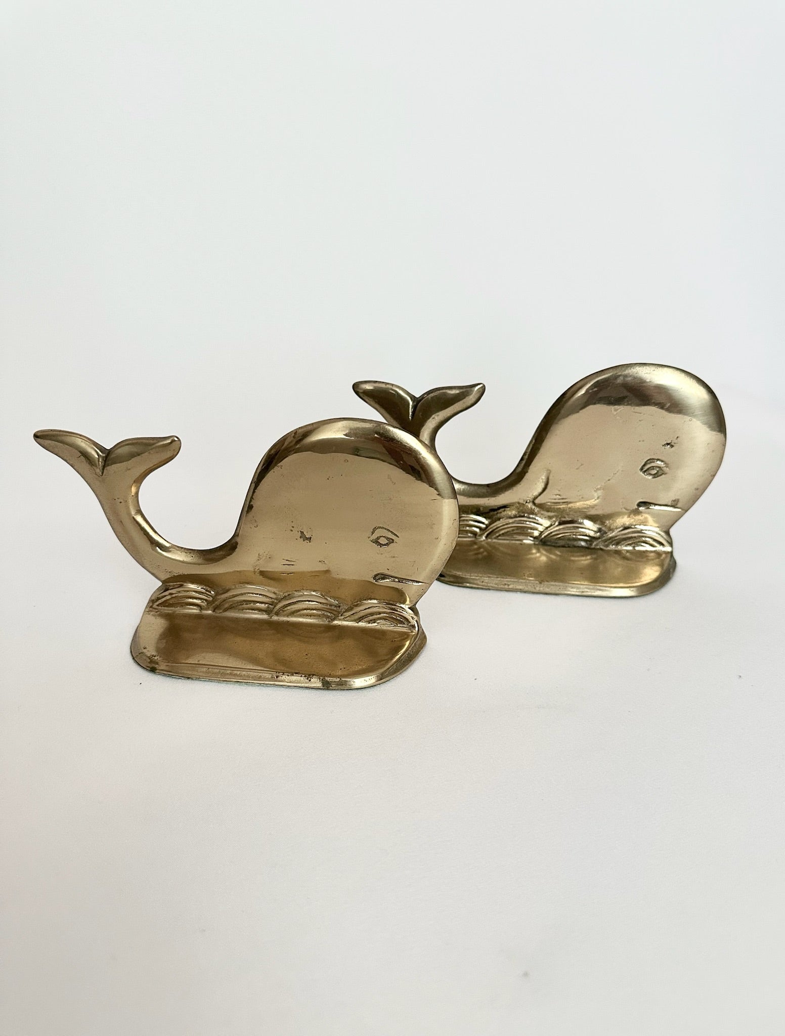 Vintage brass whale shaped bookend set of two