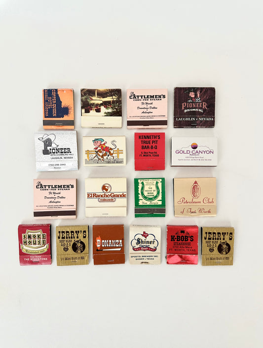Collection of 18 vintage matchbooks and matchboxes of a western theme 