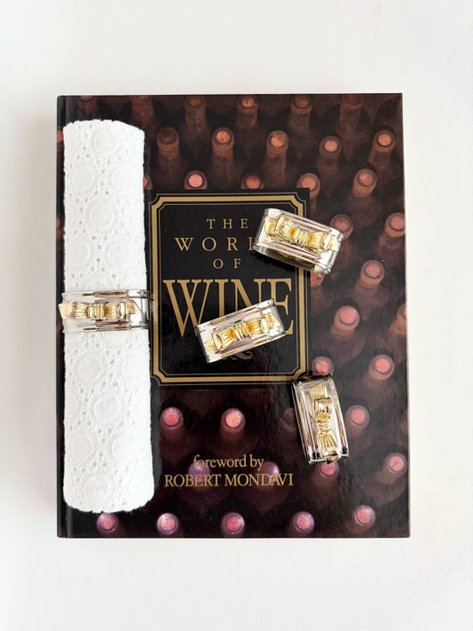 vintage silverplate napkin rings with gold bows set of four