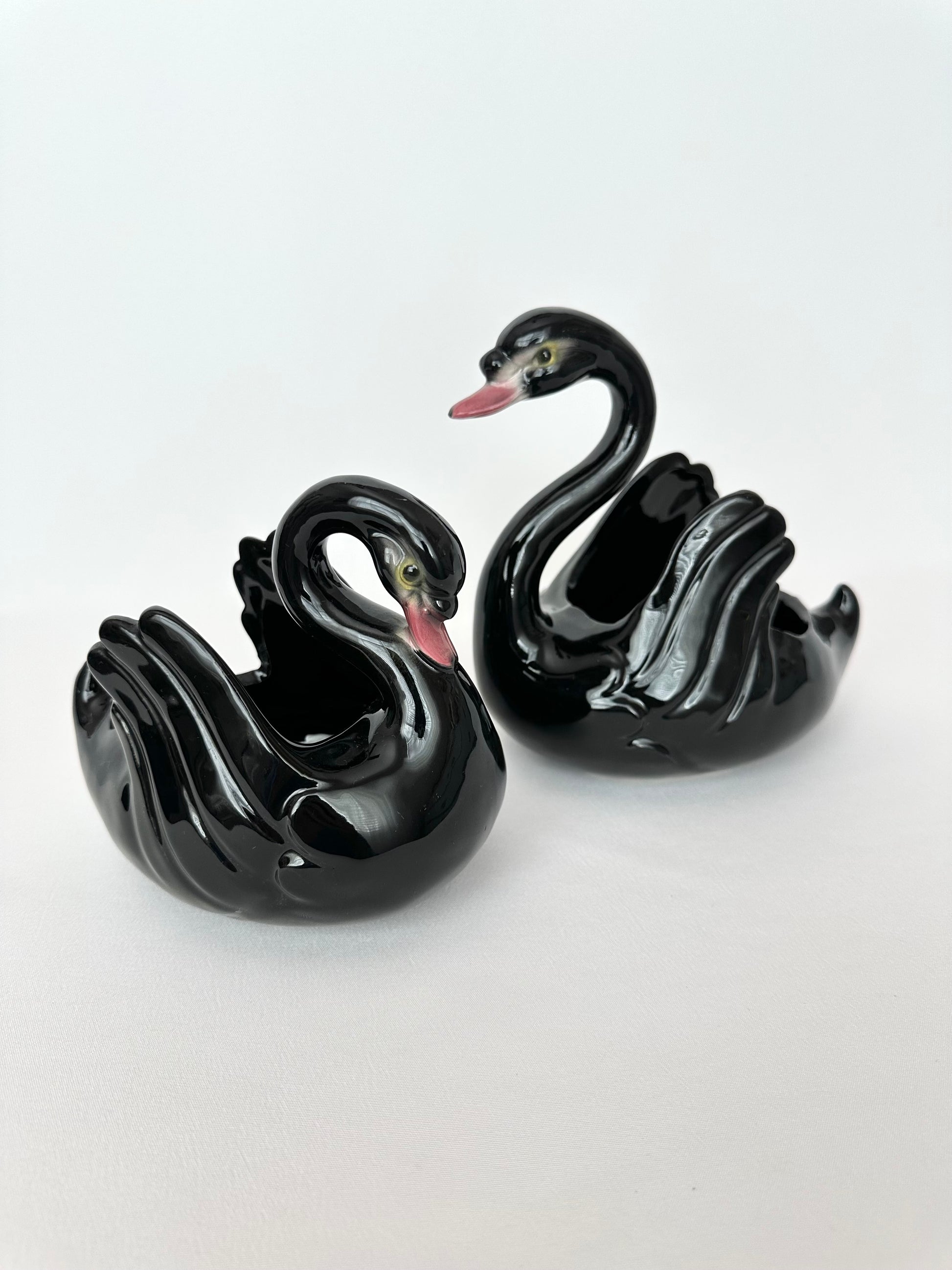 vintage pair of black ceramic swan planters or containers