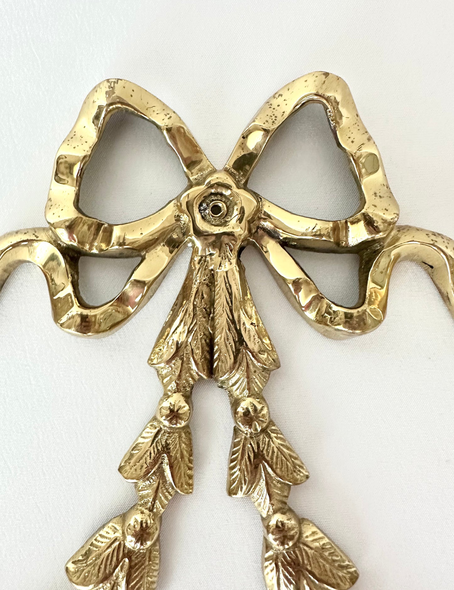 Maéva Brass Bow Plaque