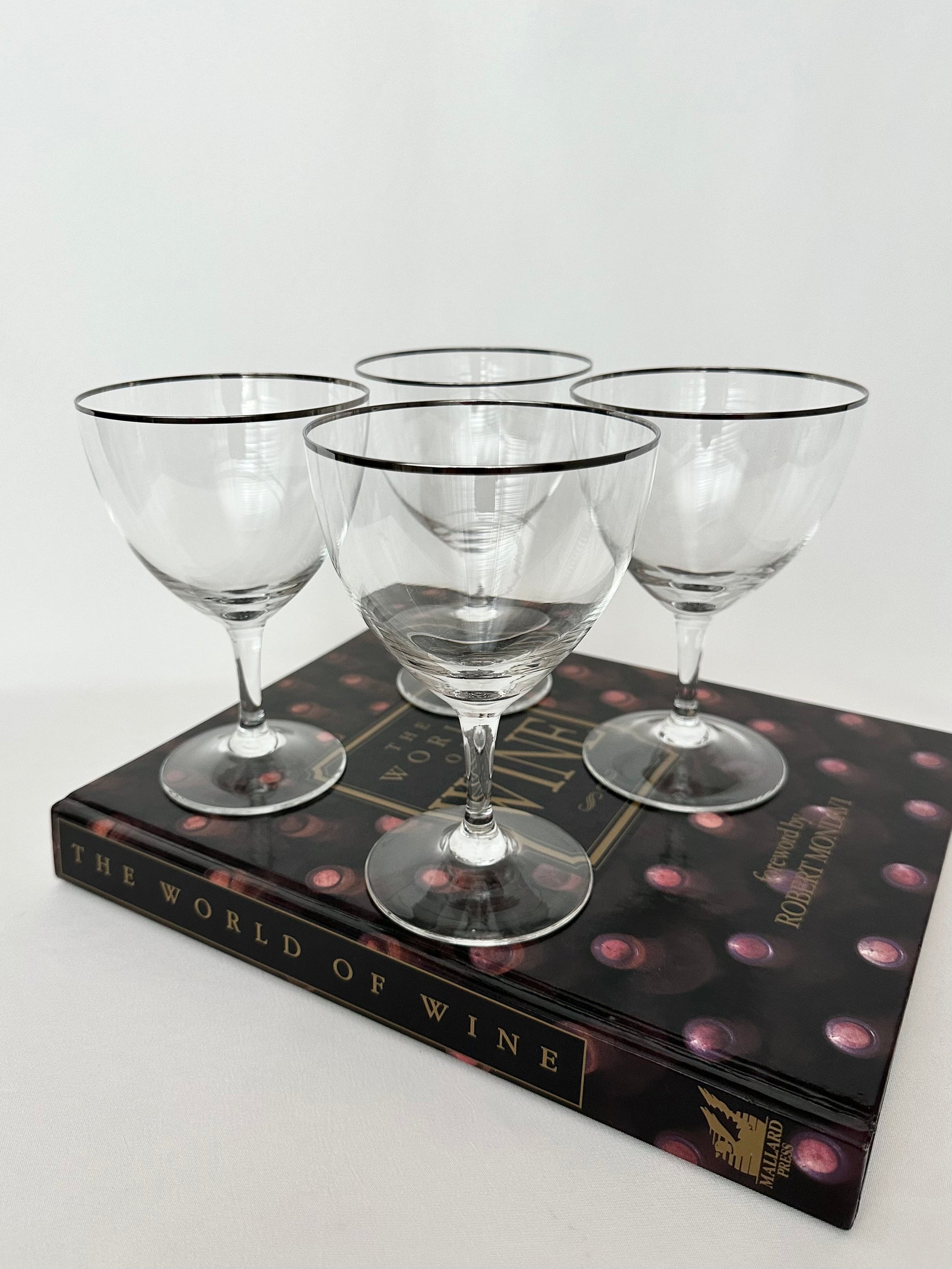 Vintage crystal platinum rimmed wine goblets set of four.