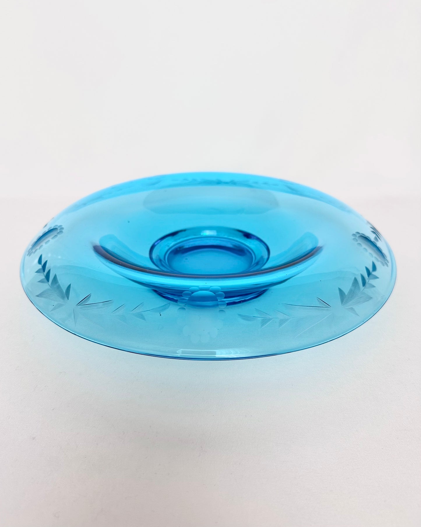 Vintage turquoise depression glass rolled rim low bowl with botanical etching