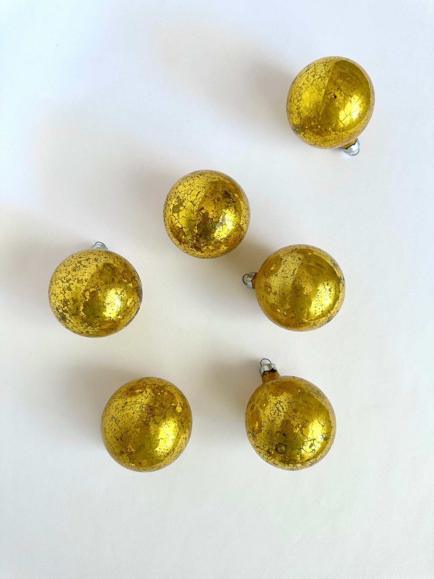 Vintage gold christmas ornament balls with patina. Set of six.