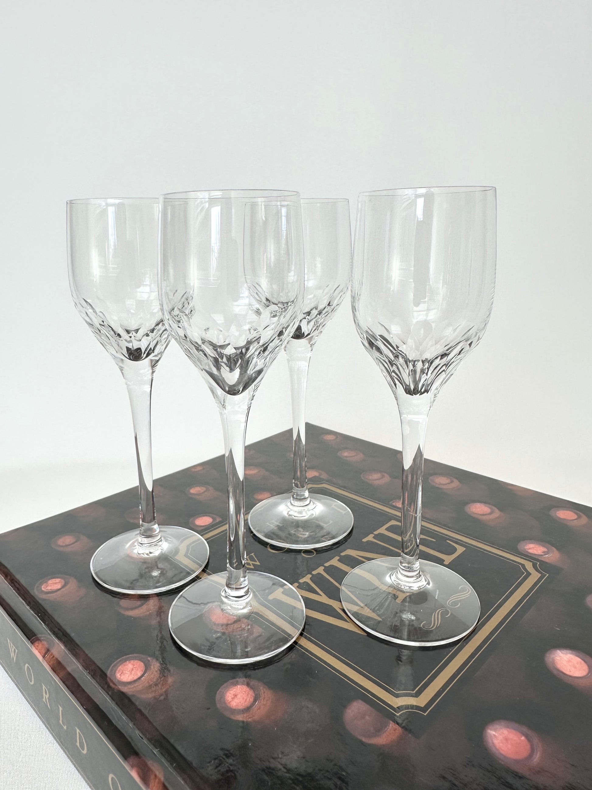 Crystal small thumbprint patterned stemmed cordials set of four by Orrefors.