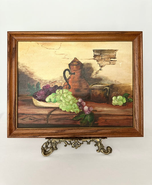 Vintage wood framed original still life painting of a jug and fruit.