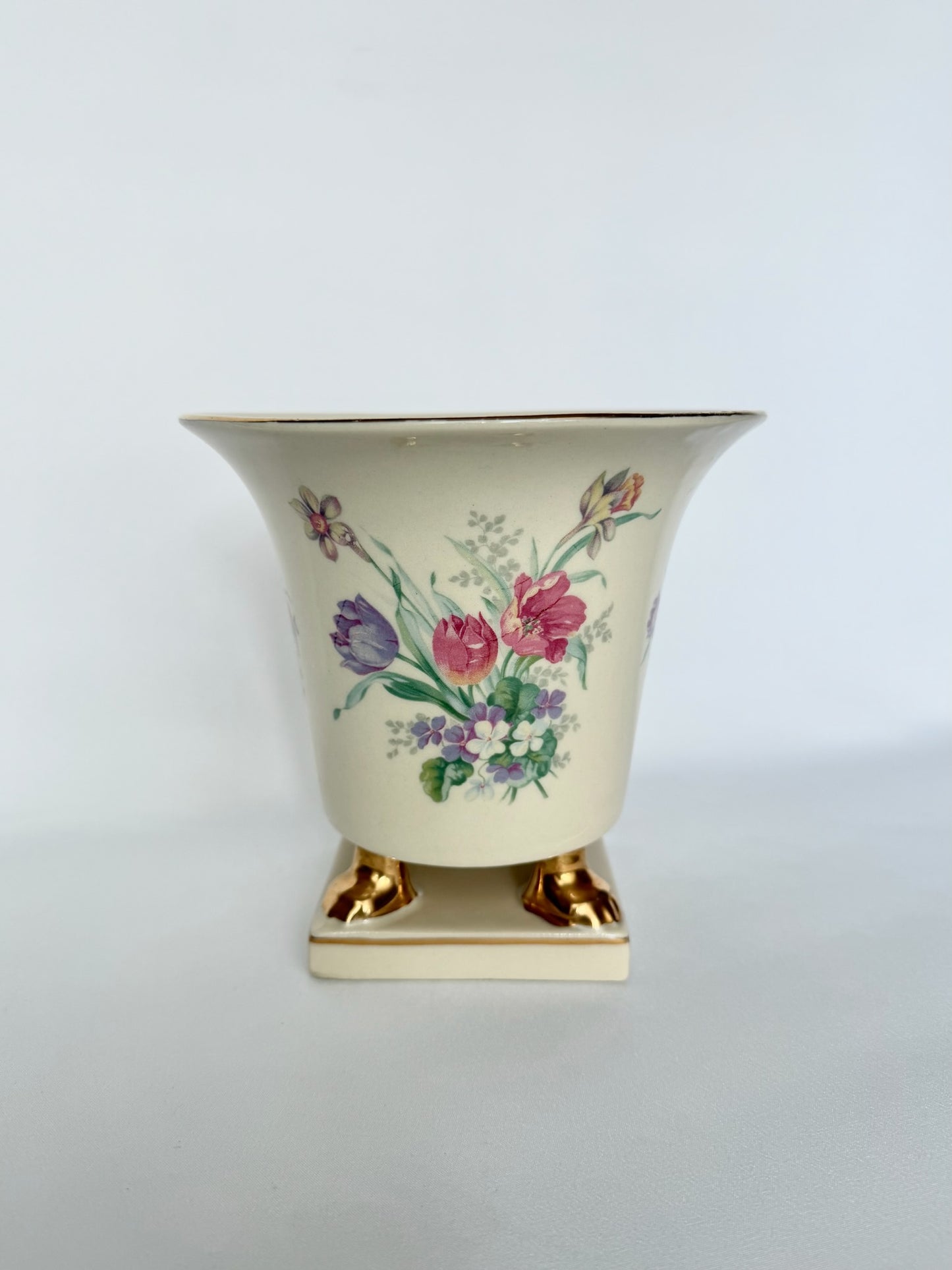 vintage ceramic gold clawfooted cache pot with hand painted flowers