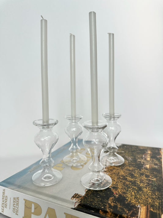 mini handblown clear glass candlestick holders with mini white tapers set of four