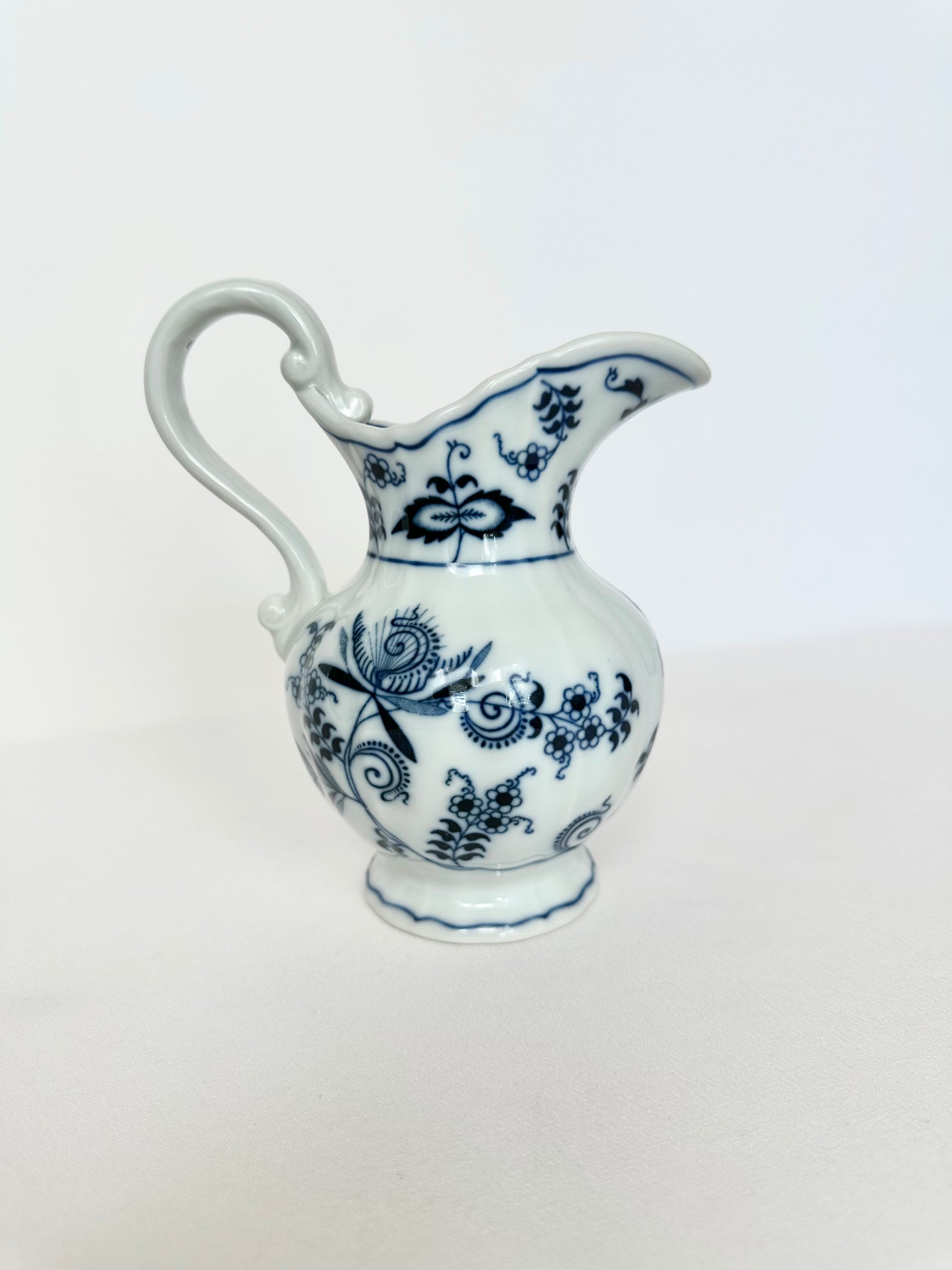 vintage blue and white large creamer in the blue onion pattern by Danube 