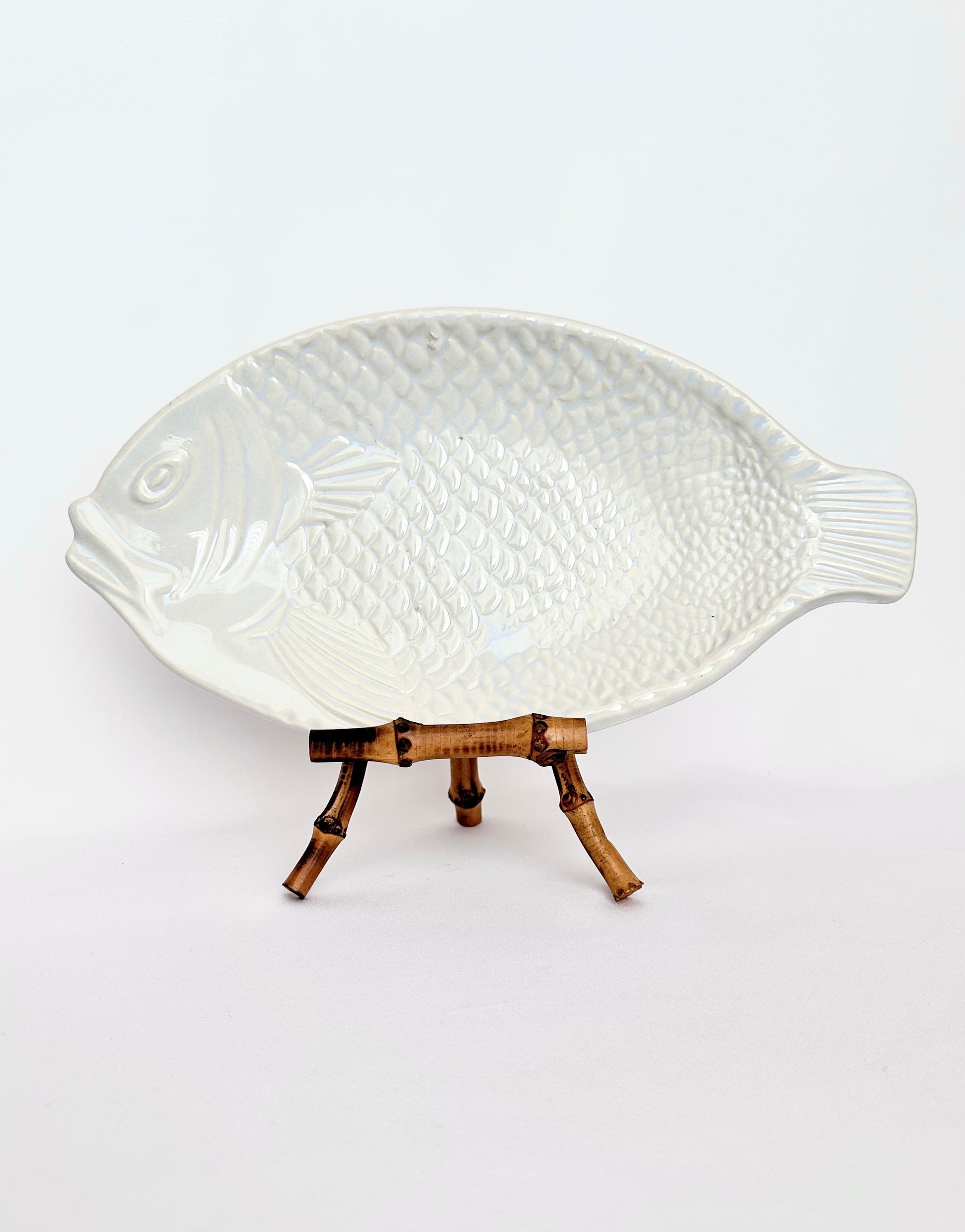 Vintage off white textured ceramic fish shaped serving platter.