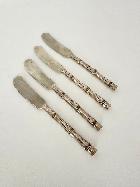 Vintage brass bamboo small spreaders set of four.