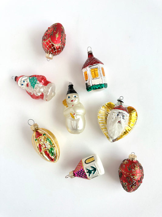 Vintage novelty figurine blown glass christmas ornaments set of eight.