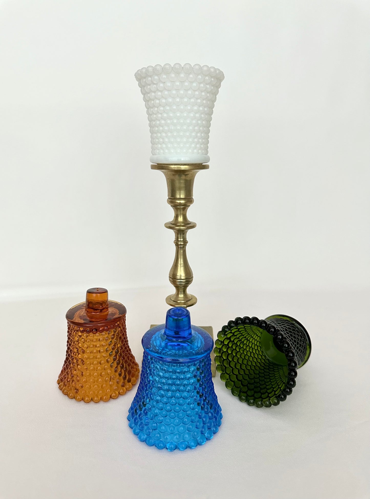 Vintage hobnail or 1000 eyes glass peg votive tea light cups in four colors. Set of two.