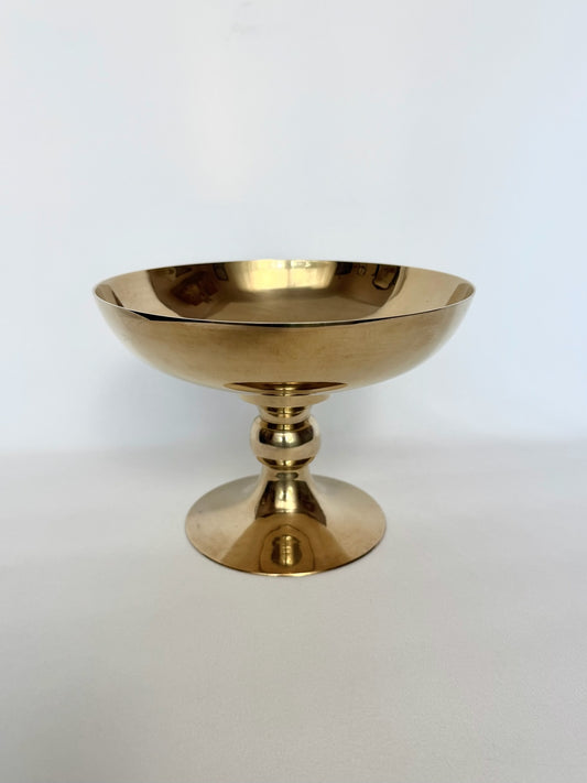Vintage shiny brass minimalist pedestal bowl with ball stem and wide base.