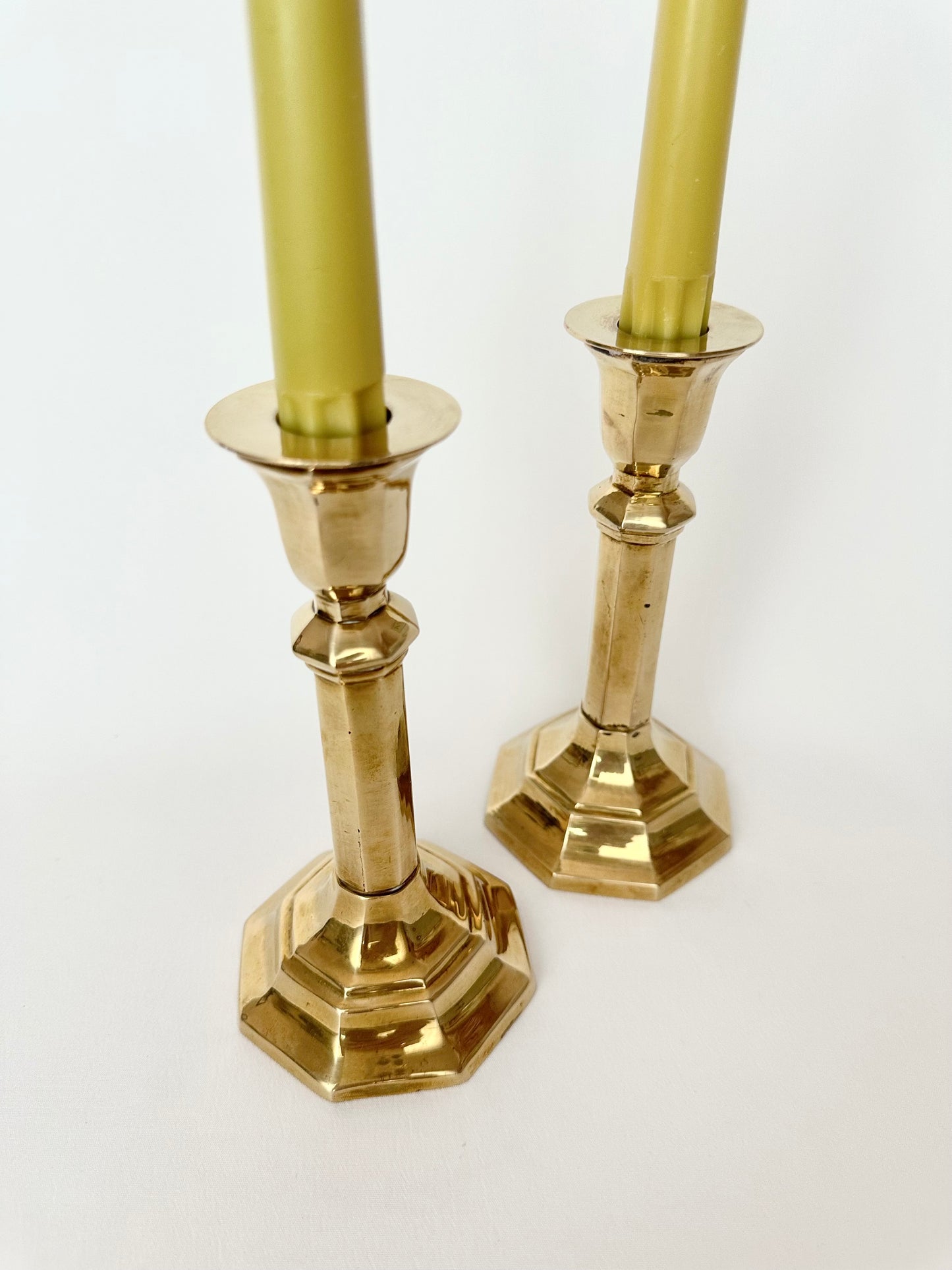 Vintage brass candlesticks with octagonal base. Set of two.