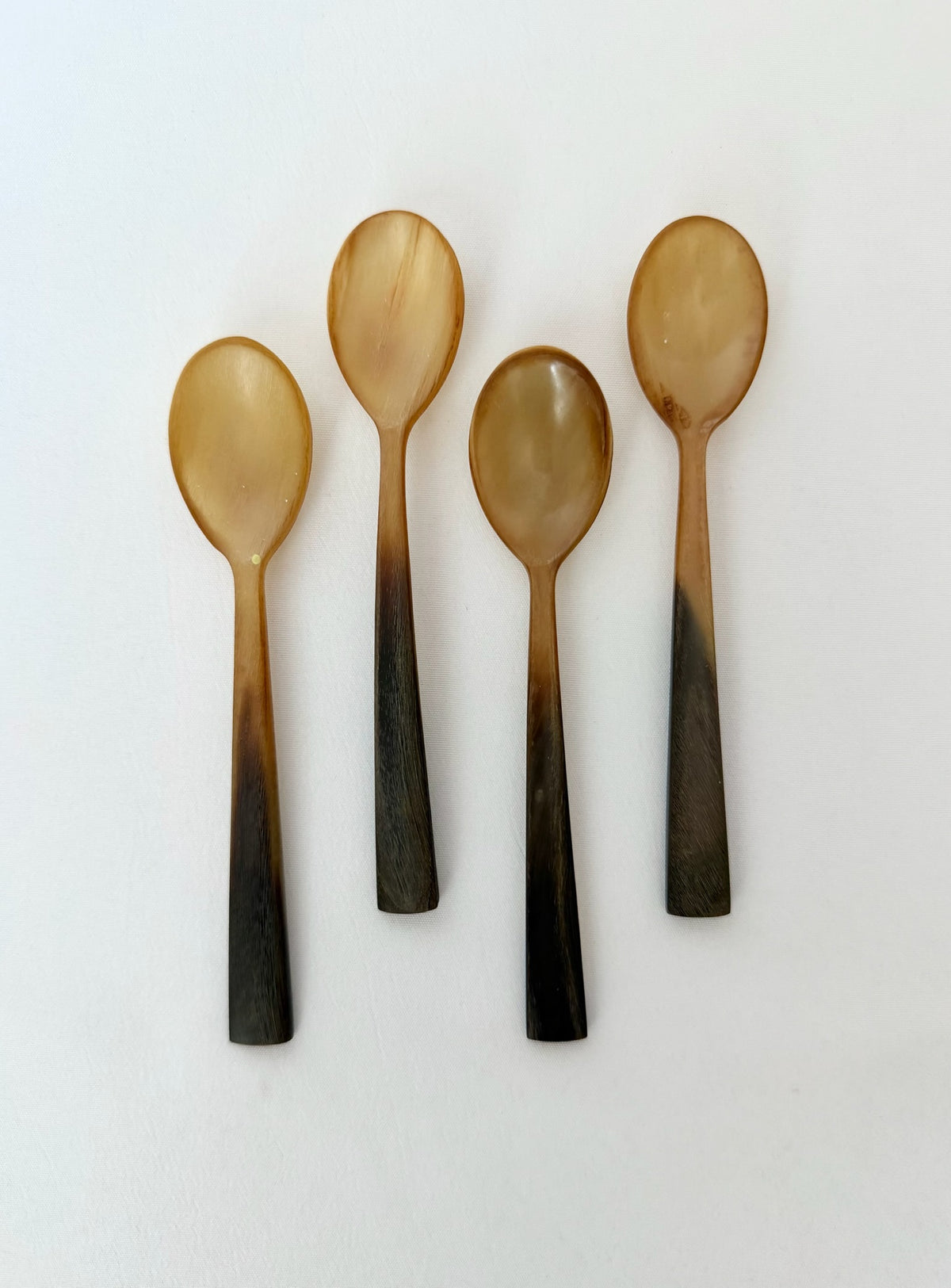 Vintage small natural horn caviar or demi tasse spoons set of four.
