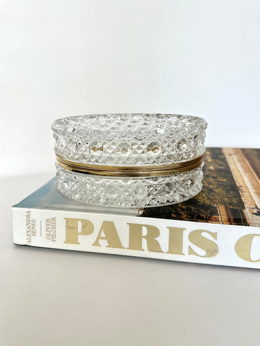 vintage heavy crystal oval shaped jewelry casket with gold metal trim