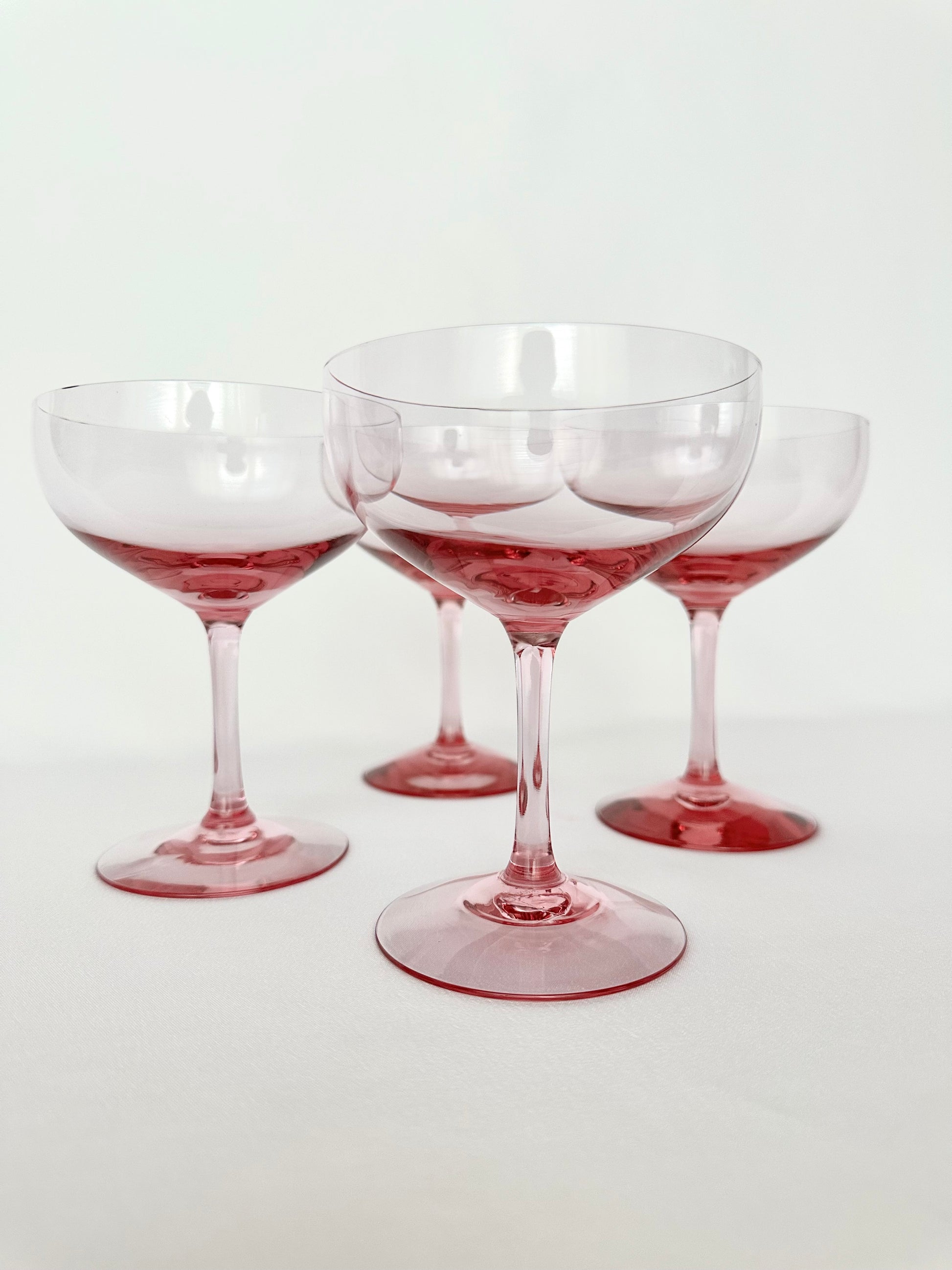 Vintage pink crystal coupes set of four.