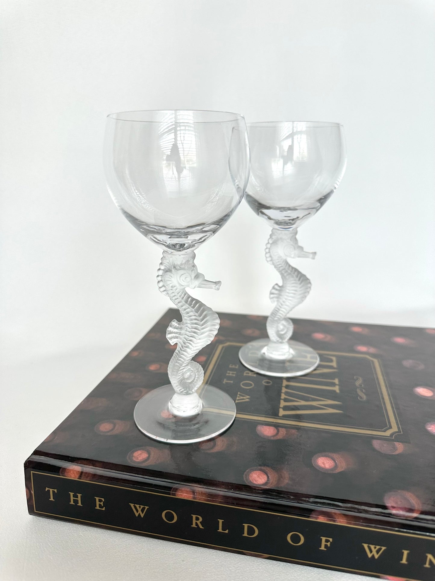 Vintage crystal small red wine or claret glasses with seahorse stem. Bayel France