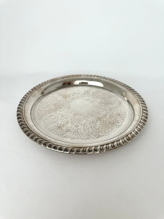 Small vintage etched, rope edged round silverplate serving tray.