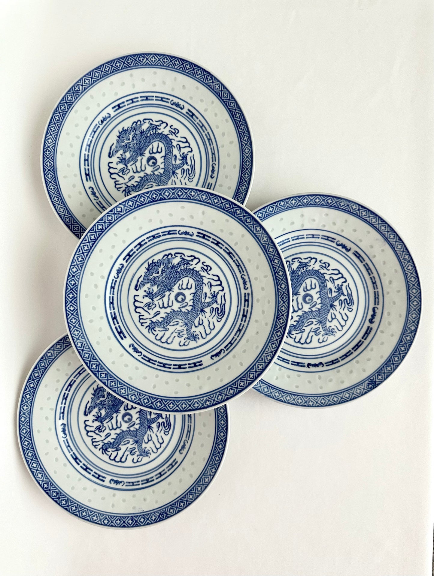 Vintage classic blue and white chinoiserie small plates set of four.