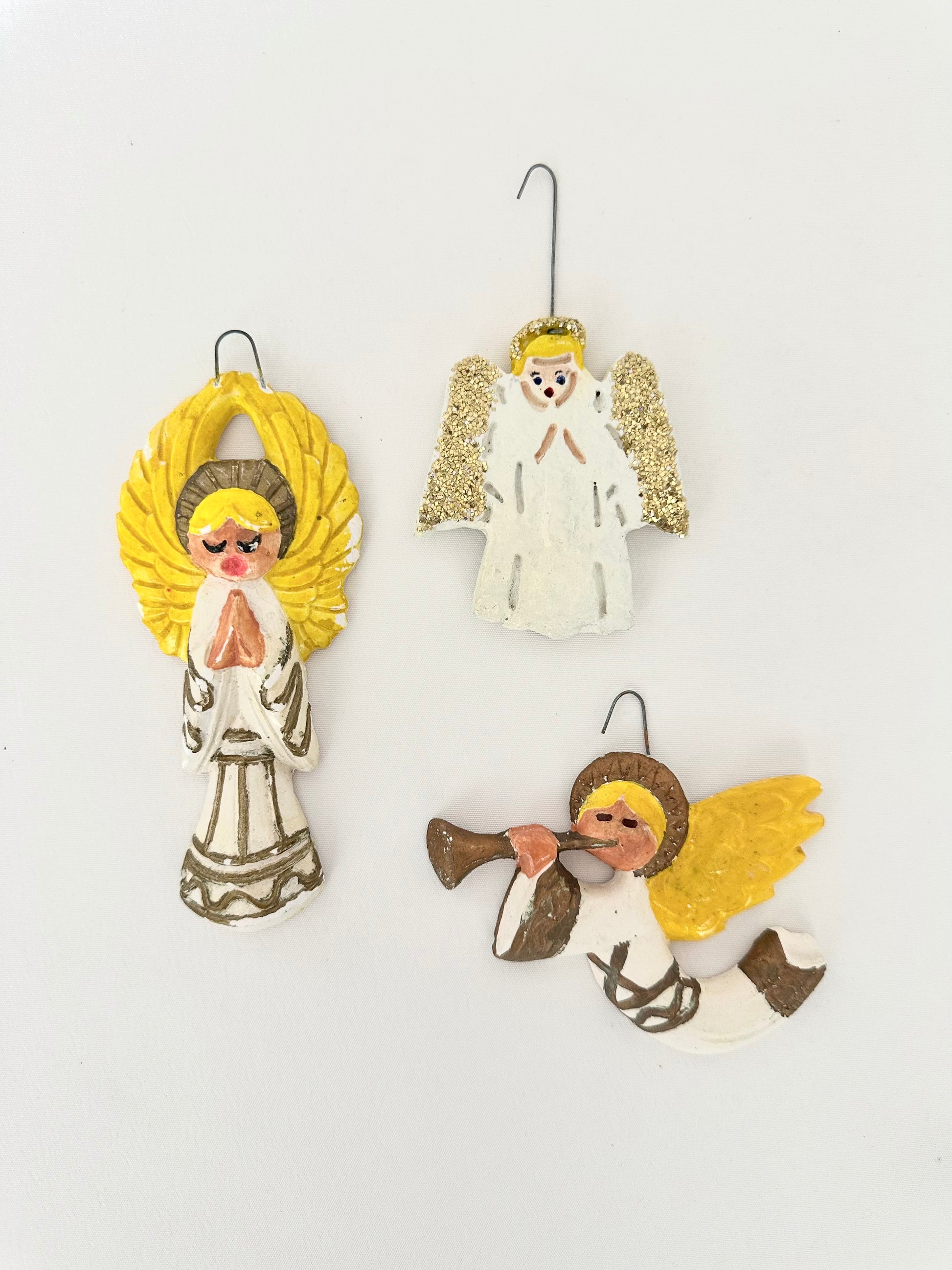 Vintage handmade plaster angel shaped christmas tree ornaments set of three.