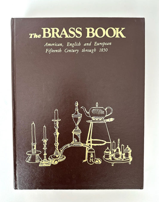 Vintage coffee table reference book about brass objects