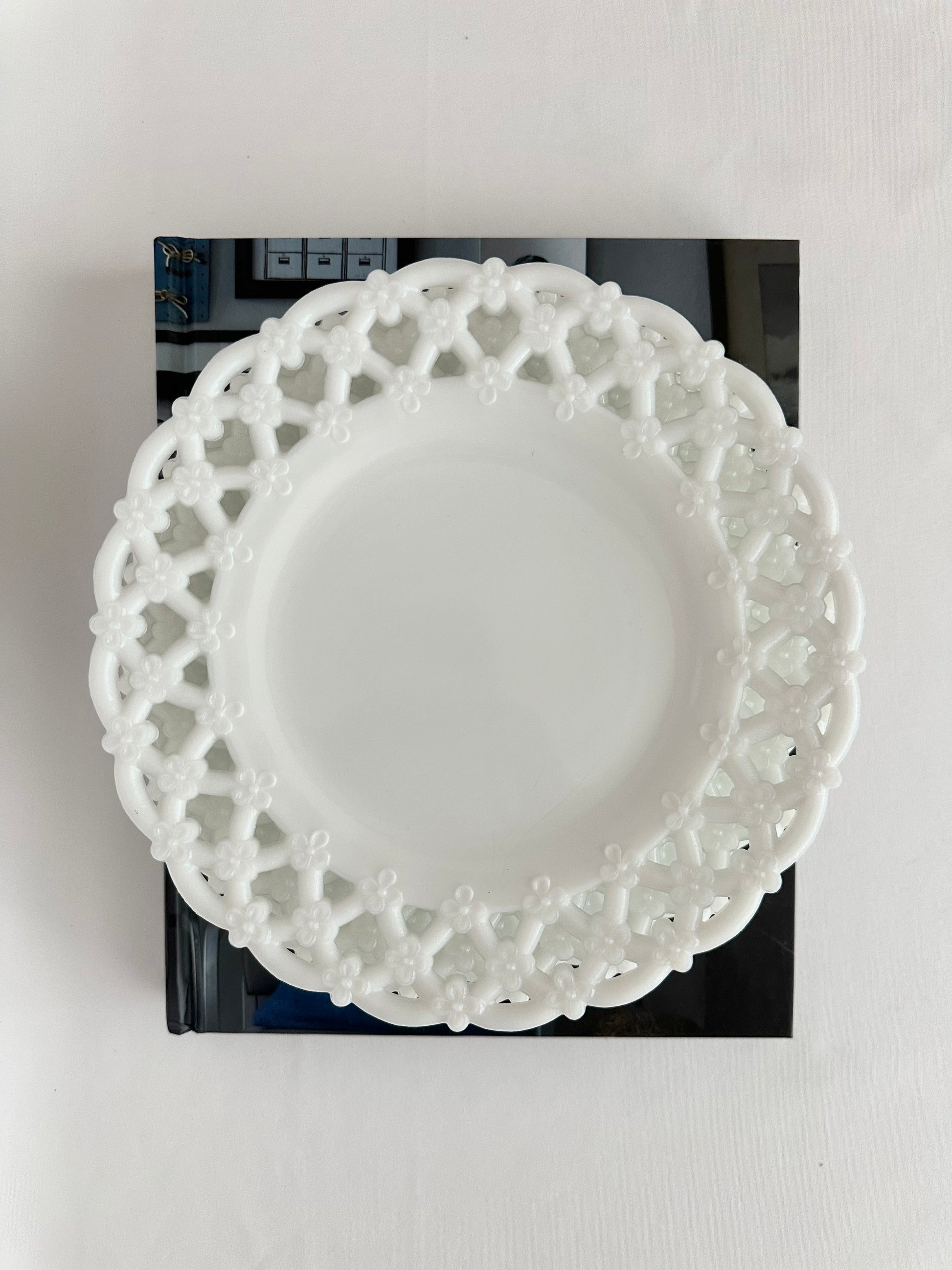 Vintage white milk glass small plates set of four with lacy edge.