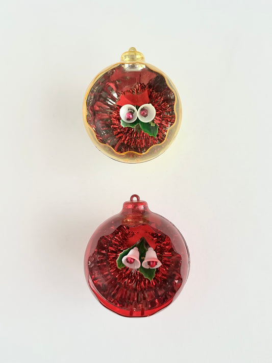 Vintage plastic Jewel Brite diorama christmas tree ornaments set of two in red and yellow.