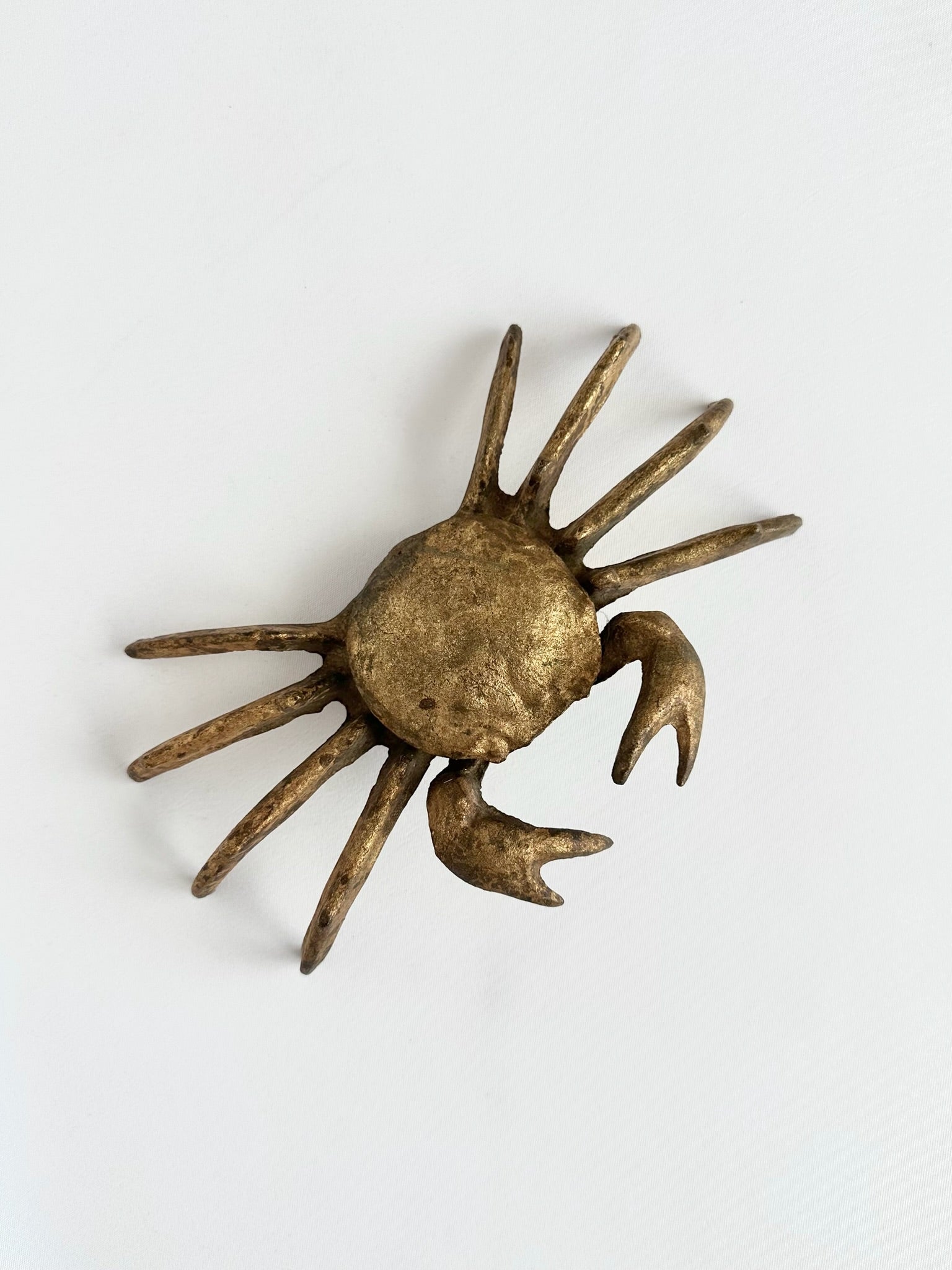 cast metal gold painted crab decorative object