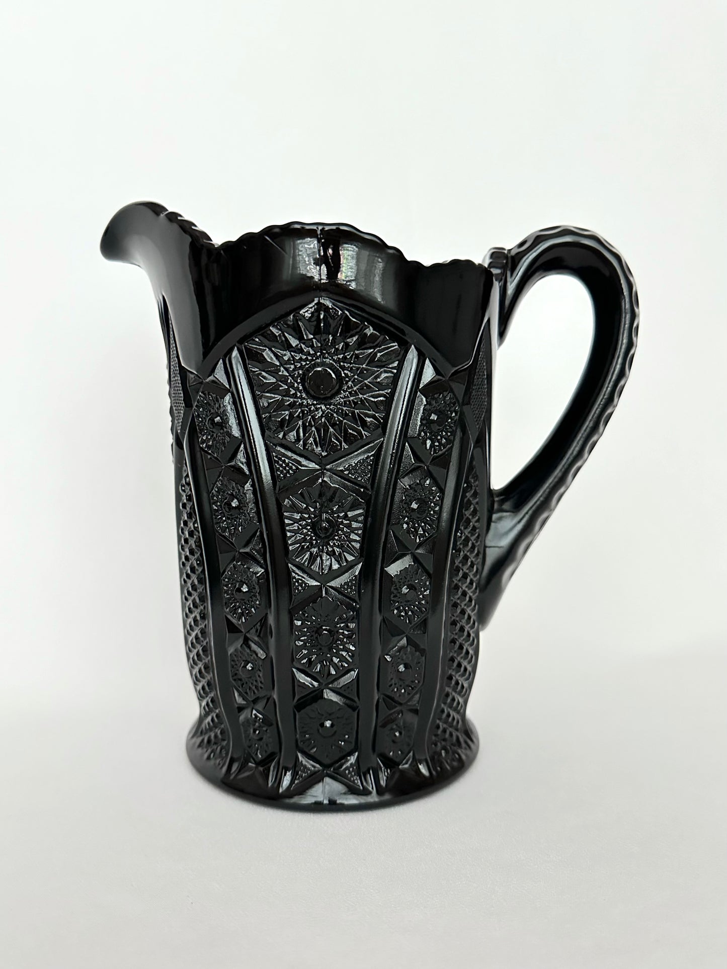 Vintage black cut glass pitcher.