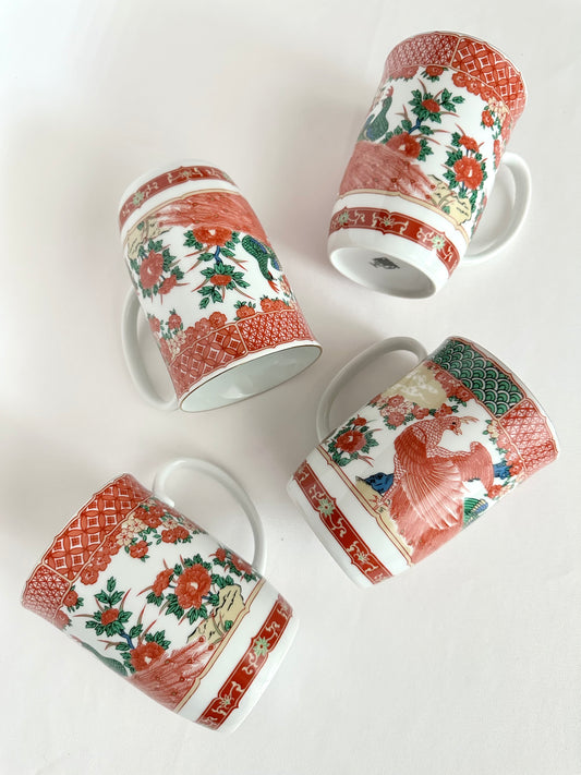 Vintage orange and white chinoiserie coffee mugs set of four.